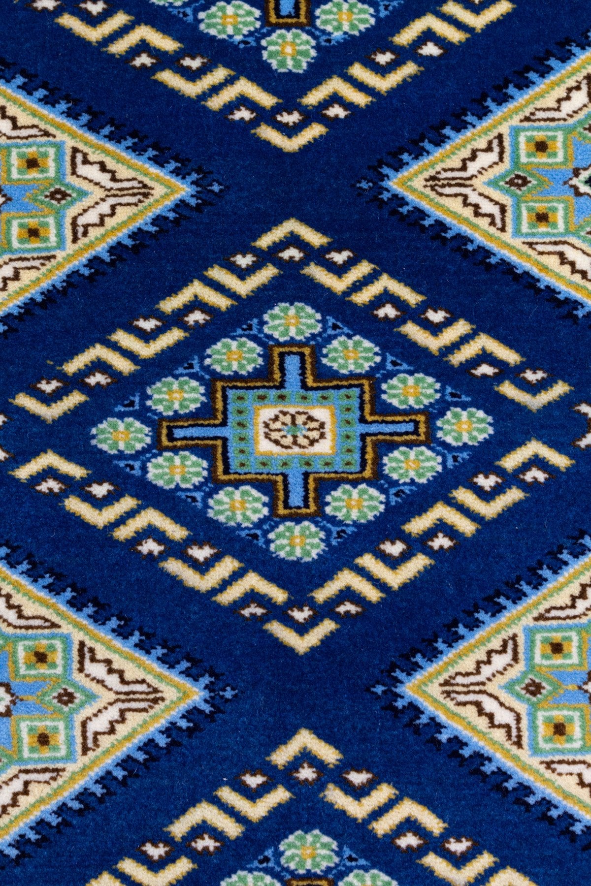 幾何学模様の青色パキスタン絨毯