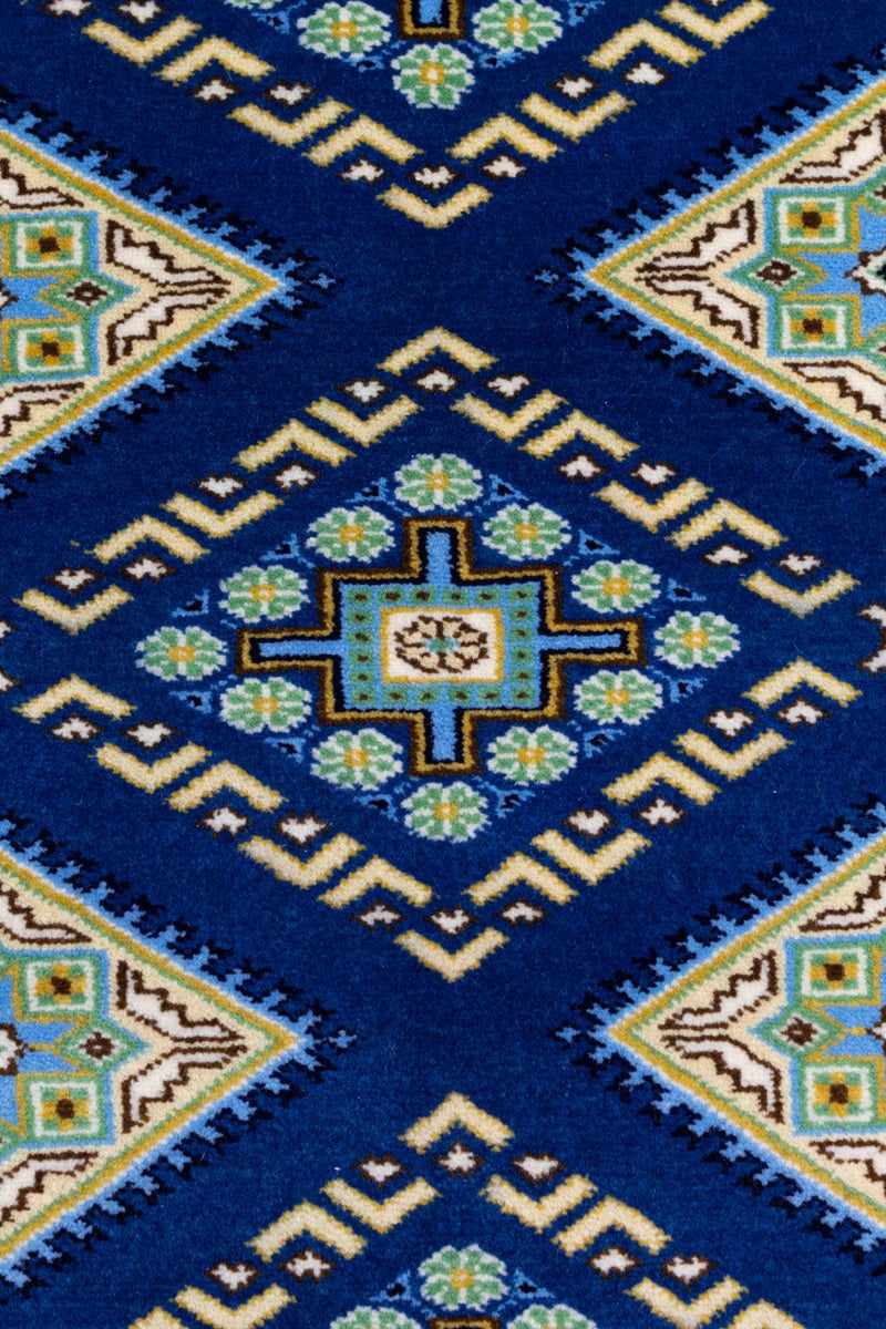 パキスタンのパンジャーブ州、ラホールで織られた手織り絨毯の模様の詳細