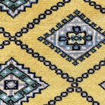 黄色のパキスタンのカーペット