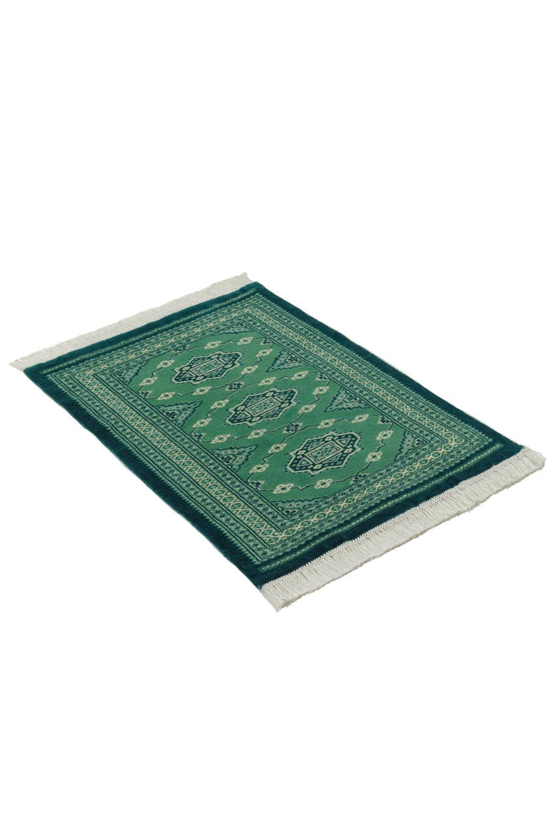 緑のパキスタン絨毯