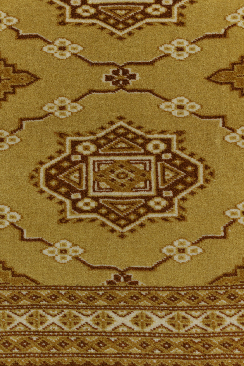 100%ニュージーランド産ウール使用。パキスタンのパンジャーブ州で織られた絨毯。縁取りは明るい茶色で、ベージュと山吹色の絶妙な組み合わせ。
