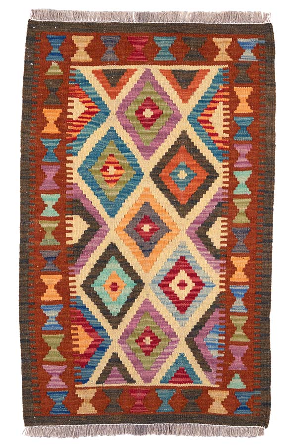 アフガニスタン産の手織りウールキリム。斬新なカラーリングと幾何学模