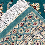 ペルシャ絨毯の技法を受け継いだ緑のパキスタン絨毯