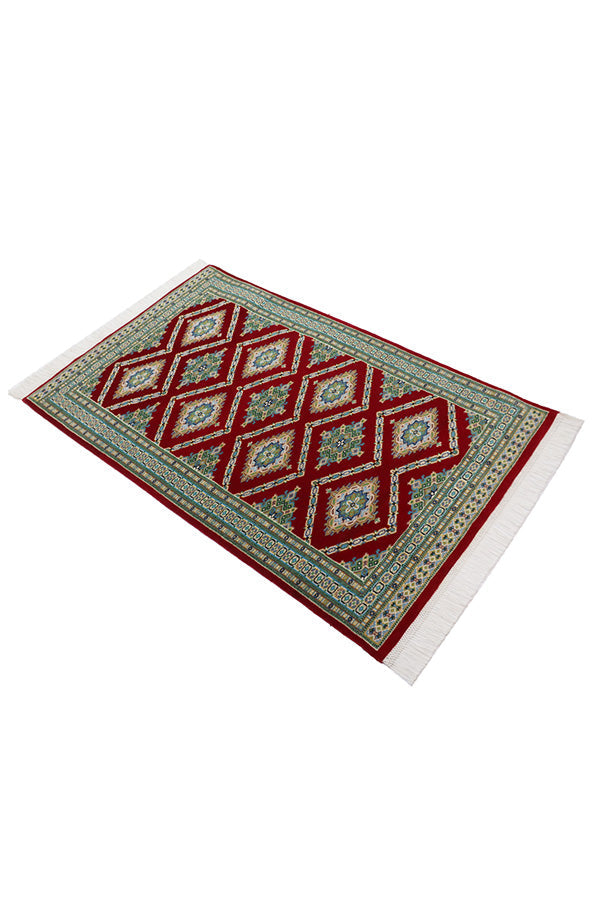赤いパキスタン絨毯に青白緑花模様